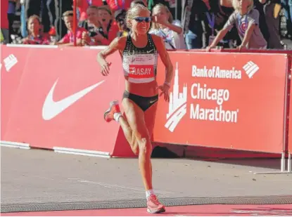  ?? | GETTY IMAGES ?? Jordan Hasay set the race record for American women and had a third- place finish of 2: 20: 22 in her second marathon.