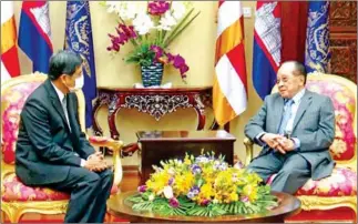  ?? HOR NAMHONG VIA FB ?? Thai ambassador to Cambodia Cherdkiat Atthakor (left) meets with Deputy Prime Minister Hor Namhong on December 27.