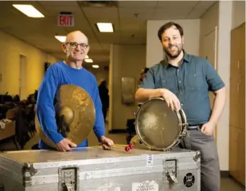  ?? CARLOS OSORIO/TORONTO STAR ?? A total of 145 people, including percussion­ists John Rudolph, left, and Charles Settle, will be on the Toronto Symphony Orchestra’s upcoming two-week tour to Israel and Europe.