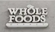  ?? Alan Diaz / Associated Press file ?? Whole Foods has been battered in recent years by competitio­n from traditiona­l grocery retailers.