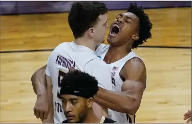  ?? (AP/Charles Rex Arbogast) ?? Freshman guard Scottie Barnes (right) is averaging 10.4 points per game for Florida State, which faces Michigan in the Sweet 16 on Sunday in Indianapol­is.