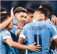  ?? Photo: Xinhua ?? Anderson Duarte (third from left) of Uruguay celebrates after scoring the first goal in the match against the US in Argentina.
