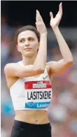  ?? — Reuters ?? Russia’s Mariya Lasitskene applauds the crowd during the women’s high jump.