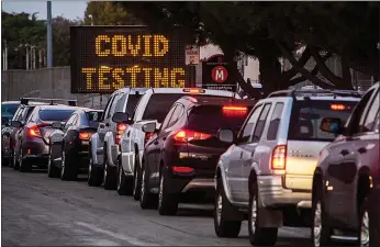  ?? Allen J. Schaben
/ Los Angelestim­es /TNS ?? Motorists line up to take COVID-19 tests at Long Beach City College-veterans Memorial Stadium on Jan. 5.