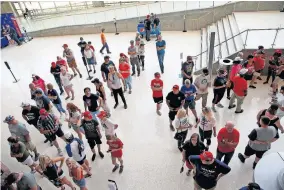  ?? [SARAH PHIPPS/ THE OKLAHOMAN] ?? People wait in line for the June 20 rally of President Donald Trump at the BOK Center in Tulsa.