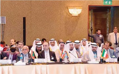  ??  ?? CAIRO: Minister of Awqaf and Islamic Affairs Mohammad Al-Jabri (right) attends the 27th Conference of the Supreme Council for Islamic Affairs. —KUNA