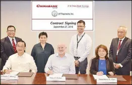  ??  ?? Photo shows (seated, from left) China Bank president William Whang, AF Payments president and CEO Peter Maher, and China Bank executive vice president Rosemarie Gan during the contract signing. The ceremony was witnessed by (standing, from left) China Bank Savings first vice president Agerico Agustin, China Bank vice president Carol Chua, AF Payments senior business developmen­t manager Raymond Joseph Dolor, and China Bank Savings first vice president Adonis Yap.