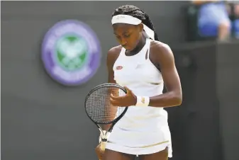  ?? Glyn Kirk / AFP / Getty Images ?? American Coco Gauff, 15, reacts after a point against Romania’s Simona Halep during their fourthroun­d match. Halep won 63, 63. Gauff was the youngest Week 2 participan­t since 1991.