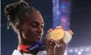  ??  ?? Dina Asher-Smith shows off her three medals. Photograph: Mustafa Abumunes/ AFP via Getty Images