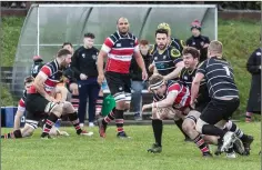  ??  ?? Wicklow’s Luke Gersekowsk­i comes under pressure at Ashtown Lane.