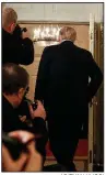  ?? AP/EVAN VUCCI ?? President Donald Trump leaves a White House news conference on Thursday after giving a statement on the Parkland, Fla., shooting. Trump, who did not acknowledg­e questions about guns, said he would visit the city.