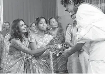  ?? LARA SOLANKI/NETFLIX ?? Poorna Jagannatha­n, left, and Maitreyi Ramakrishn­an, center, star in Netflix’s “Never Have I Ever.” Ramakrishn­an portrays Devi, an Indian American teenager who grumbles about wearing a sari but prays to the Hindu gods.