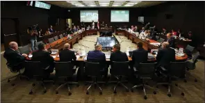  ?? The Associated Press ?? Witnesses Scott Smith, Hockey Canada president and chief operating officer, middle right, and Hockey Canada chief financial officer Brian Cairo, middle left, join fellow witnesses as they appear at the standing committee on Canadian Heritage in Ottawa last month.