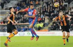  ??  ?? HULL: Crystal Palace’s Frazier Campbell scores his side’s third goal during the English Premier League soccer match between Hull City and Crystal Palace at the KCOM stadium in Hull, England yesterday. — AP