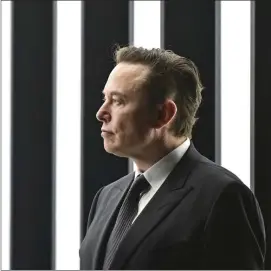  ?? PATRICK PLEUL — POOL VIA AP, FILE ?? Elon Musk, Tesla CEO, attends the opening of the Tesla factory Berlin Brandenbur­g in Gruenheide, Germany, March 22, 2022.