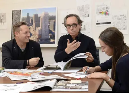  ?? AARON HARRIS FOR THE TORONTO STAR ?? Lifetime Developmen­ts’ Brian Brown, left, Montana Steele creative director Andy DeSantis, and his daughter Diana try their hand at the new craze.