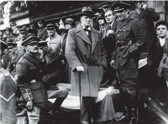 ??  ?? Winston Churchill, then secretary of state for war, at a procession of the 47th Division of the British army, Lille, France, October 1918