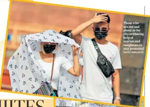  ?? PHOTO: AMAL KS/HT ?? Those who are out and about in the city are taking help of scarves and sunglasses to stay protected