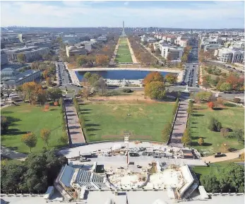  ?? SAUL LOEB, AFP/GETTY IMAGES ?? The presidenti­al inaugurati­on stand is under constructi­on at the National Mall on Nov. 15, 2016. President-elect Donald Trump will take the oath of office Jan. 20.