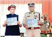  ??  ?? Home Minister Rajnath Singh with ITBP DG Krishna Chaudhary during the 55th Raising Day Parade of the force at Greater Noida on Friday