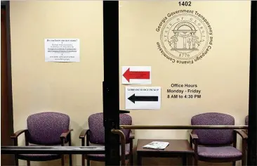  ?? PHIL SKINNER ?? State contractor­s are supposed to fifile reports onwhat they spend on stateemplo­yees with theGeorgia Government Transparen­cy and Campaign Finance Commission in the Sloppy Floyd Building in downtown Atlanta.