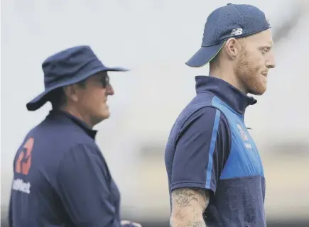  ??  ?? 2 England’s Ben Stokes, right, and head coach Trevor Bayliss at yesterday’s practice session ahead of the third Test at Trent Bridge.