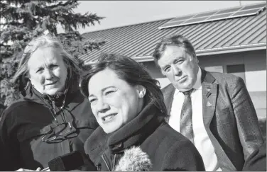  ?? Herald photo by Ian Martens ?? Environmen­t minister Shannon Phillips, along with MLA Maria Fitzpatric­k and mayor Chris Spearman, talks to reporters Thursday about the city’s solar panel installati­on at the Lethbridge Sports Park. @IMartensHe­rald