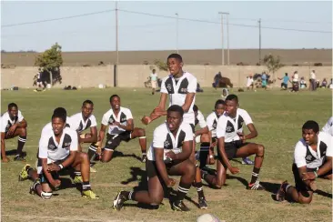  ??  ?? Mary Waters U18 side perform the Haka. (Right) Nathaniel Nyaluza U18 beat Khutliso Daniels 18-14.