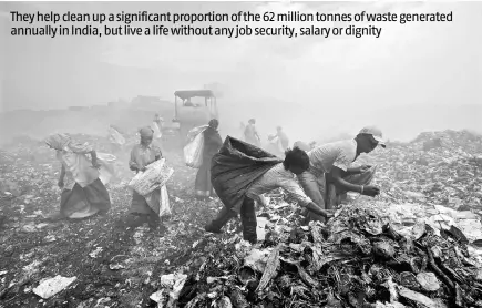  ?? REUTERS ?? Ragpickers collect scraps from a dumpyard in Hyderabad. In India, the segregatio­n of garbage from landfills is done informally by ragpickers