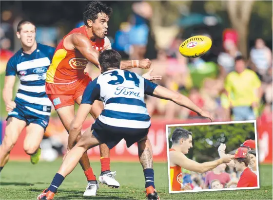  ?? GOOD START: Suns player Jack Martin during yesterday’s clash against Geelong and ( inset) Brayden Fiorini gives his hat to a young fan. Picture: ALIX SWEENEY ??