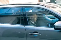  ?? JAE C. HONG/THE ASSOCIATED PRESS ?? John Eastman, a former lawyer of Donald Trump, slightly visible in the back seat, and his attorneys, Randall Miller, right, and Zachary Mayer arrive Tuesday for a hearing in Los Angeles.