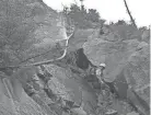  ?? NATIONAL PARK SERVICE/AP FILE ?? Water sprays from a break in the Grand Canyon trans-canyon waterline as a worker attempts repairs. Work has begun giving some of America's most spectacula­r natural settings and historic icons a makeover.