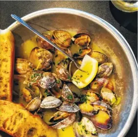  ?? LYNDA BALSLEV-TASTEFOOD ?? Butter and garlic clams