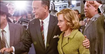  ??  ?? Compelling: Tom Hanks as attorney James Donovan with wife Mary (Amy Ryan)