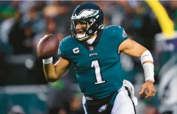 ?? NFL NOTES MATT ROURKE/AP ?? Eagles quarterbac­k Jalen Hurts runs during the NFC championsh­ip game Sunday in Philadelph­ia.