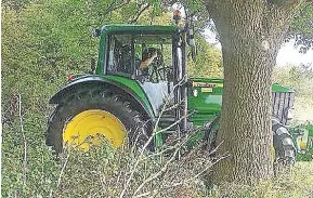  ??  ?? A speed camera operative working from inside a non-police marked tractor.