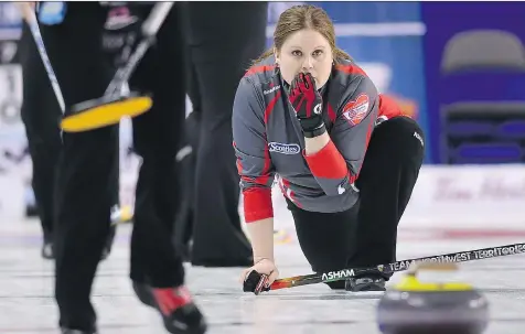  ?? SEAN KILPATRICK/THE CANADIAN PRESS ?? Northwest Territorie­s skip Kerry Galusha keeps a close watch on her shot at the Scotties Tournament of Hearts in St. Catharines, Ont., on Monday. Galusha, playing in her 10th Scotties tournament, sits at 3-1 after defeating winless B.C. 12-9.