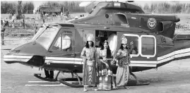  ?? PHOTO: PTI ?? Artistes dressed up as Lord Rama, Sita and Lakshman arrive in a chopper for Deepotsav celebratio­ns in Ayodhya on Wednesday