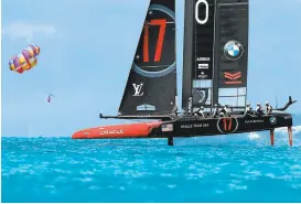  ?? EZRA SHAW/GETTY IMAGES ?? Oracle Team USA practices for the America's Cup Final on the Great Sound on Tuesday in Hamilton, Bermuda. America's Cup racing starts back up next weekend.