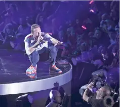  ??  ?? Martin from Coldplay performs on stage during the Global Citizen Festival G20 benefit concert in Hamburg, northern Germany on July 6. — AFP file photo