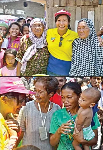  ??  ?? Zamboanga City re-electionis­t Mayor Beng Climaco with Muslim villagers. Climaco remains popular among the city’s 98 barangays due to her many accomplish­ments and dedication to serving her constituen­ts. Climaco’s political line up is likely to win...