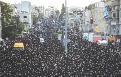  ?? (Yonatan Sindel/Flash90) ?? THOUSANDS OF ULTRA-ORTHODOX supporters of the United Torah Judaism Party rally in Jerusalem yesterday.