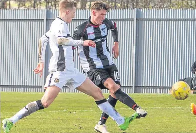  ?? Picture: Craig Brown. ?? David Hopkirk scores against Dumbarton. Today’s target is the Falkirk goal.