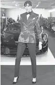  ?? KATHY WILLENS, AP ?? Ralph Lauren drove home a Bond-inspired tailored look.