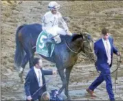  ?? DAVID M. JOHNSON — DJOHNSON@DIGITALFIR­STMEDIA.COM ?? Good Samaritan, with Joel Rosario up, is led into the winner’s circle by his connection­s after winning the Grade 2 Jim Dandy Saturday, July 29, 2017 at Saratoga Race Course.