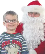  ??  ?? Christmas list Fraser Housley (3) from Kirkmichae­l with Santa