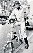  ??  ?? ‘Britain’s answer to Pierre Cardin, Ralph Lauren and Calvin Klein’: Gilbey in 1970 modelling one of his own designs