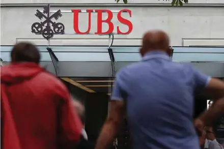  ?? BLOOMBERG PIC ?? UBS Group AG is expected to appeal an unpreceden­ted 18-month ban on sponsoring initial public offerings in Hong Kong. Sources say the ban was imposed because of the bank’s role in the listing of a firm that subsequent­ly collapsed.