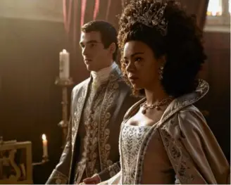  ?? LIAM DANIEL/NETFLIX ?? Corey Mylchreest as young King George III and India Amarteifio as young Queen Charlotte in “Queen Charlotte: A Bridgerton Story.”