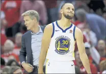  ?? NHAT V. MEYER STAFF PHOTOGRAPH­ER ?? Golden State Warriors’ Stephen Curry (30) reacts to a foul called against him in the fourth quarter of Game 5of the NBA Western Conference finals against the Houston Rockets at the Toyota Center in Houston on Thursday.